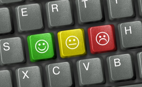 Keyboard close-up with three smiley keys